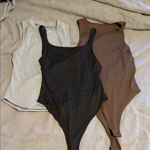 Sleeveless Bodysuit Trio - Black, Brown, and Cream NWOT